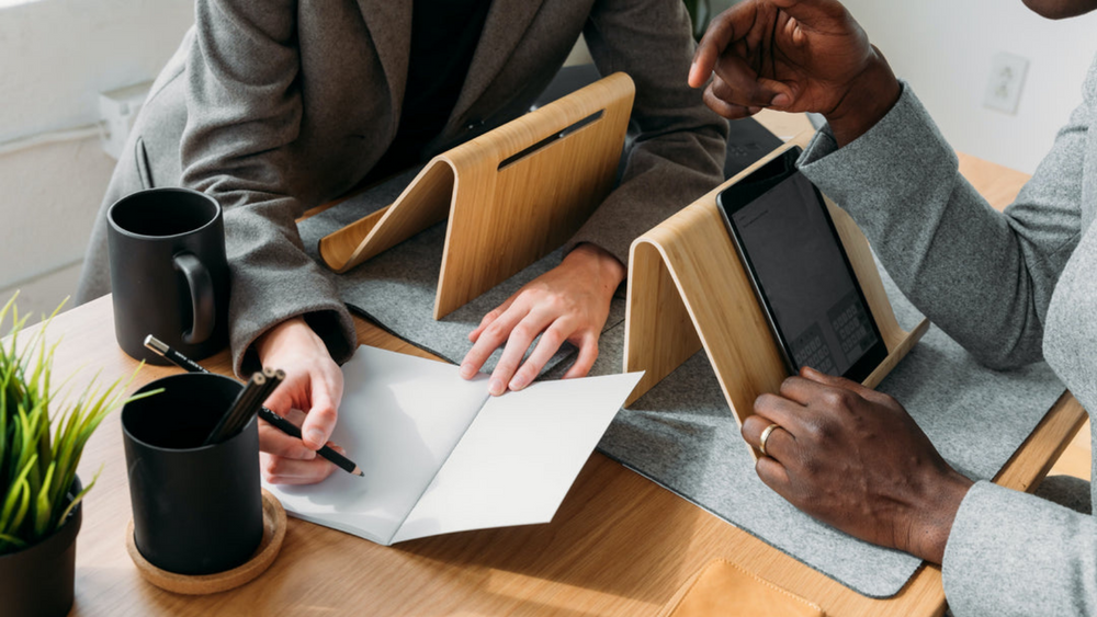 Two people working collaboratively