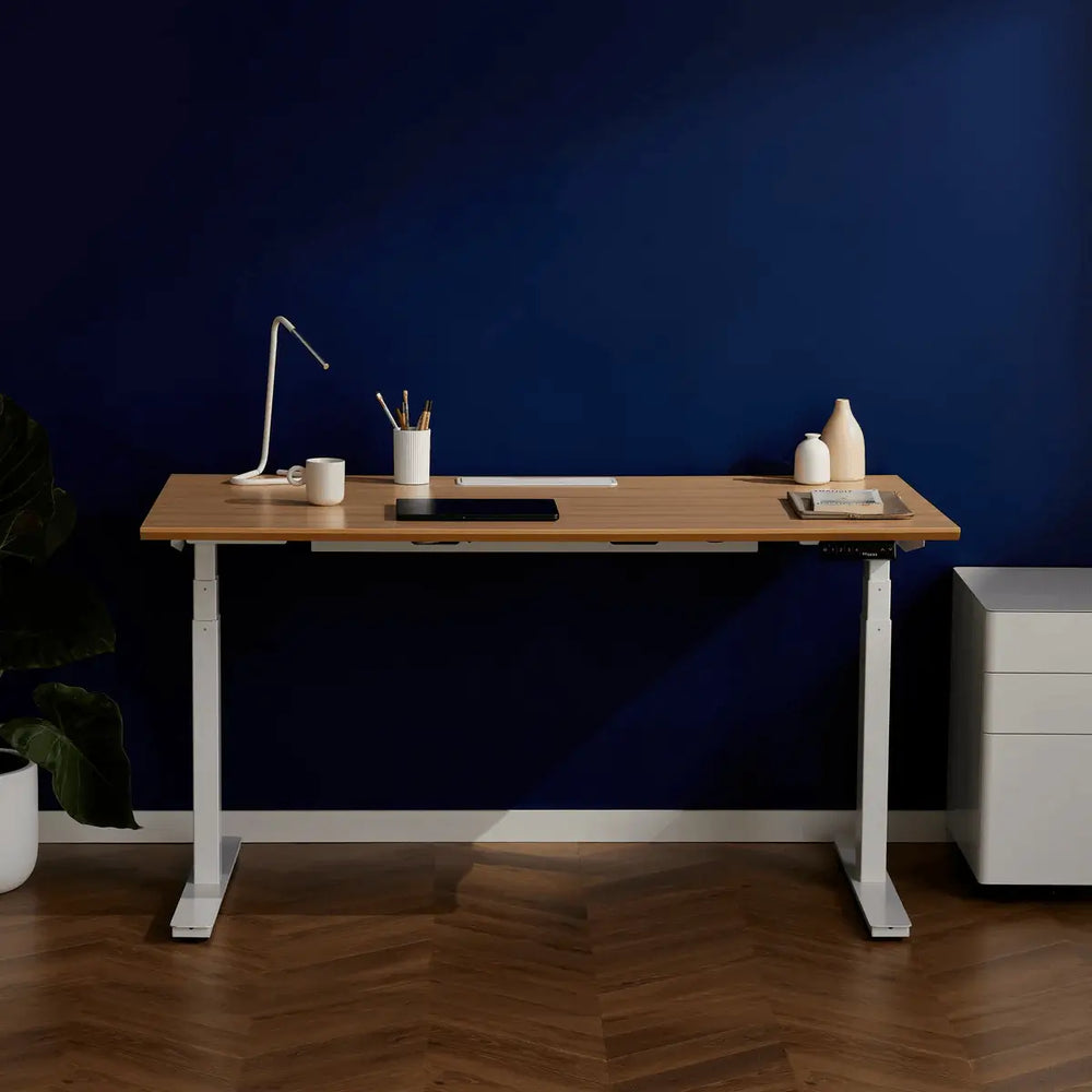 Ergonomic Recess single sit stand desk, demonstrating proper height based on standing desk ergonomics guide