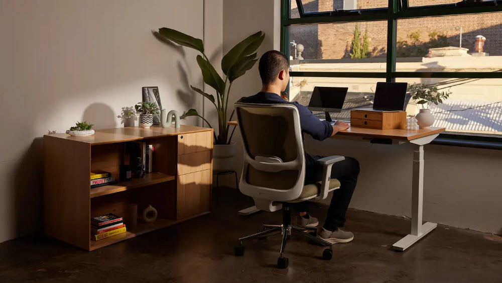 Person sitting in an ergonomic office chair